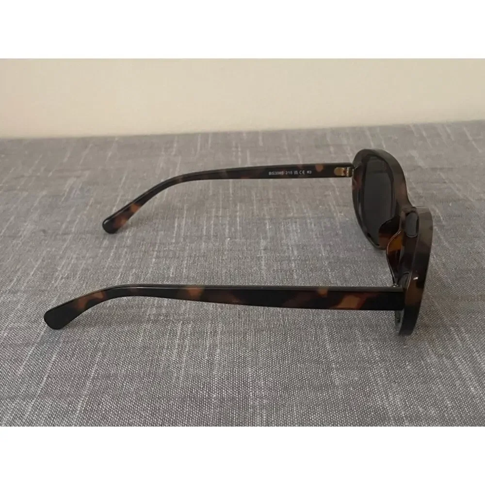 New BCBGeneration Womens Polarized Brown Tortoise Shell Oval Sunglasses